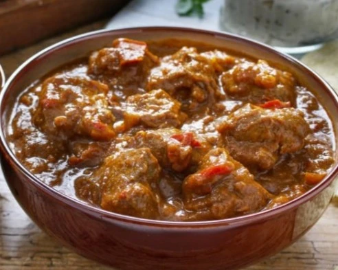 Delicious Chicken Curry dish at BHARAT HALWAI in Edmonton, AB